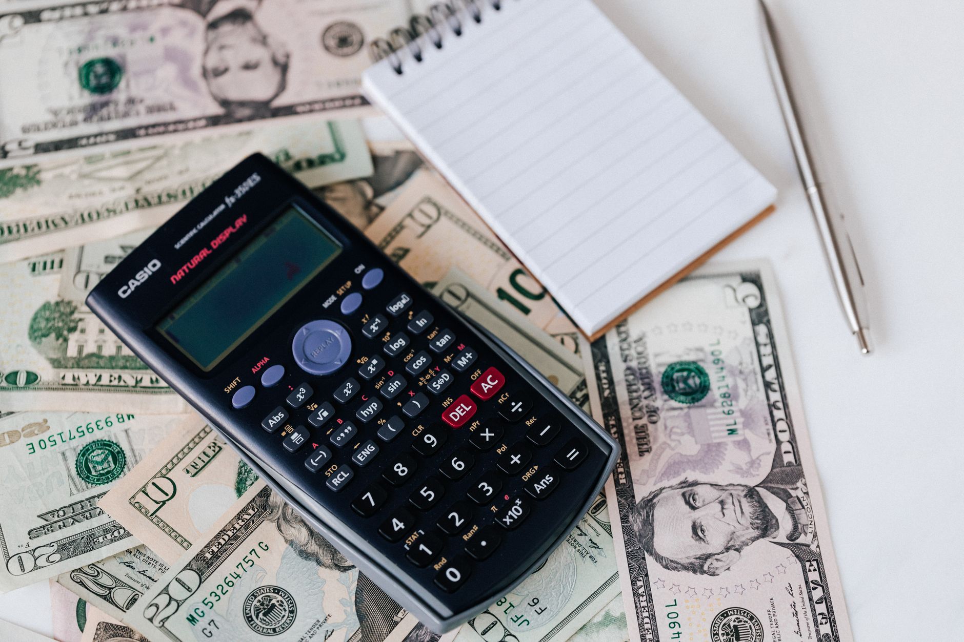 Pensions and retirement calculator on desk