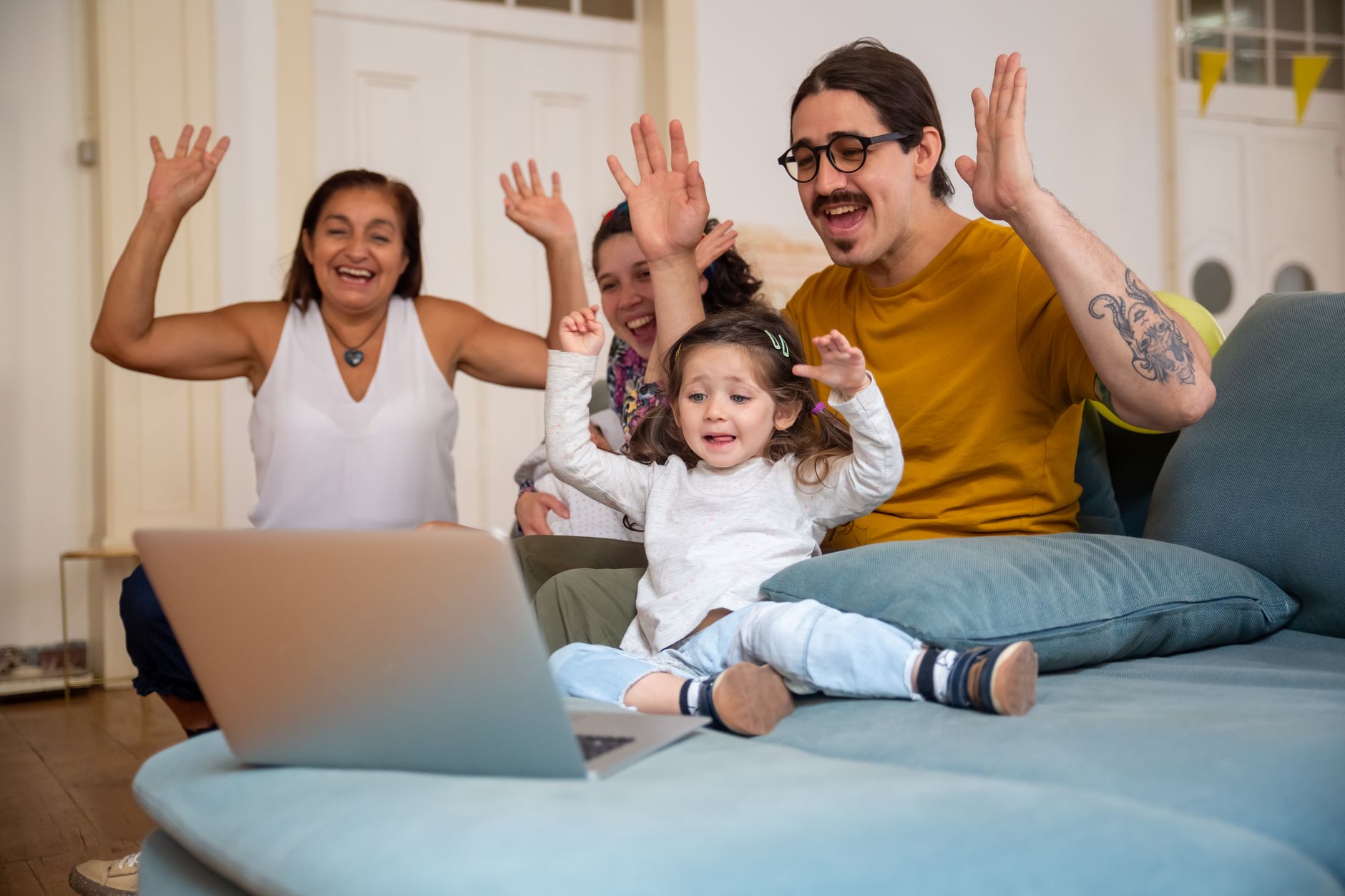 Happy family calculating their monthly budgets and future planning